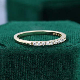 Refined 0.25ct round half eternity moissanite wedding band close up of the setting