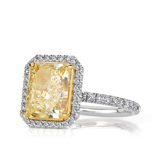 Yellow radiant moissanite halo ring side detail view