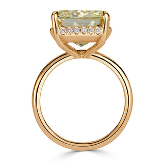 Light yellow radiant solitaire moissanite ring on hand