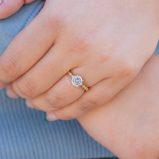 1.50 CT Round Cut Solitaire Halo Moissanite Engagement Ring on hand