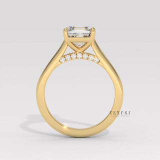 Low-angle view of a asscher cut moissanite engagement ring with a hidden halo and cathedral setting