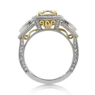 Yellow cushion three stone moissanite engagement ring close up detail