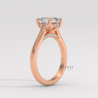 Asscher cut moissanite engagement ring with a hidden halo and cathedral setting worn on a hand