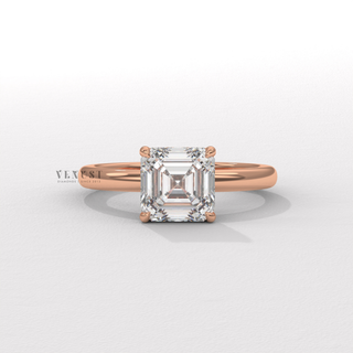 Top-down view of a asscher cut moissanite engagement ring in a hidden halo solitaire setting