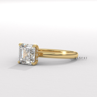 Three-quarter angle of a asscher cut moissanite engagement ring in a hidden halo solitaire setting