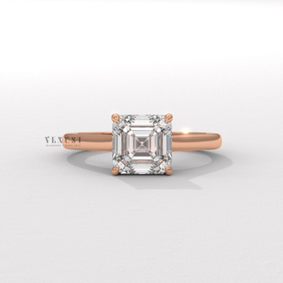 Front view of a asscher cut moissanite engagement ring with a hidden halo and cathedral setting