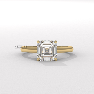 Asscher cut moissanite engagement ring with a hidden halo and cathedral setting photographed on a white background