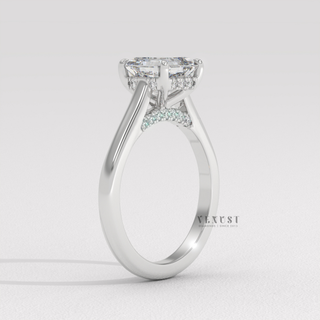 Front view of a asscher cut moissanite engagement ring with a hidden halo and cathedral setting from the left
