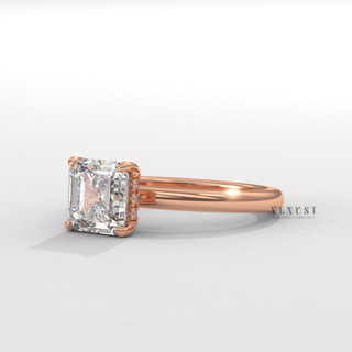 Macro shot of the centre stone on a asscher cut moissanite engagement ring in a hidden halo solitaire setting