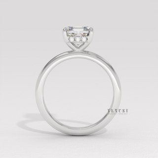 Detailed setting shot of a asscher cut moissanite engagement ring in a hidden halo solitaire setting