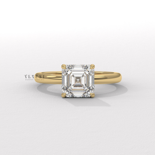 Side profile of a asscher cut moissanite engagement ring in a hidden halo solitaire setting