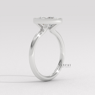 Oval bezel moissanite engagement ring on hand