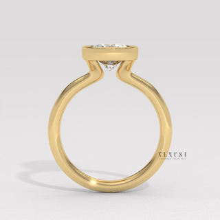 Oval cut engagement ring with modern bezel style