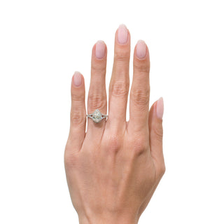 Pear halo split shank moissanite ring angled sparkle view