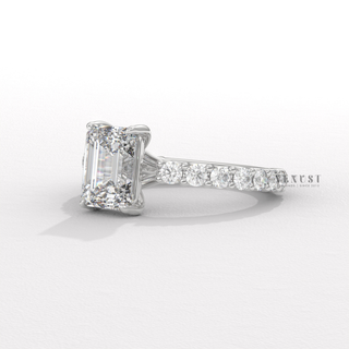 Emerald moissanite ring with step cut sparkle