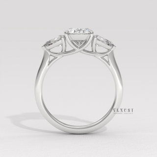 Oval moissanite solitaire ring with three stone style