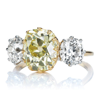 three stone moissanite ring round side stones detail