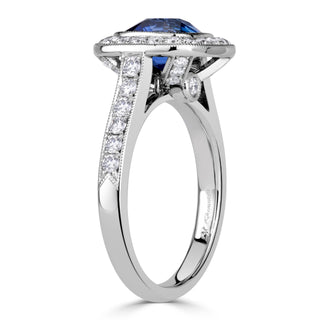Blue cushion halo moissanite engagement ring stone detail view