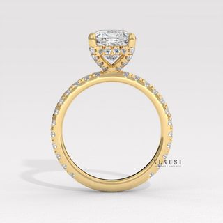 Front view of a cushion cut moissanite engagement ring with a pave band