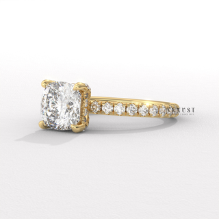 Lifestyle photo of a cushion cut moissanite engagement ring with a pave band on the hand