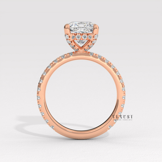 Top-down view of a cushion cut moissanite engagement ring with a pave band