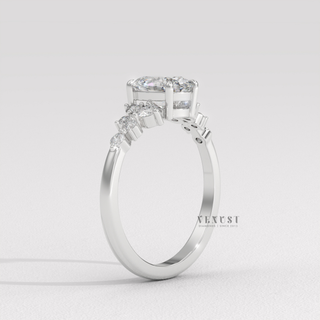 Oval cluster moissanite ring on hand