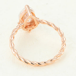 pear-shaped-moissanite-cluster-engagement-ring