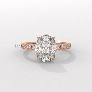 Oval cut moissanite engagement ring with pave accents