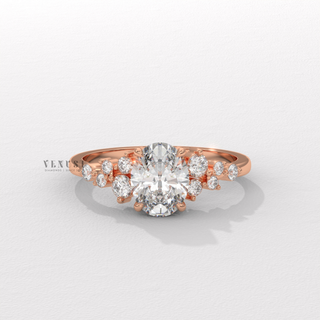 Oval cut moissanite engagement ring with cluster detail