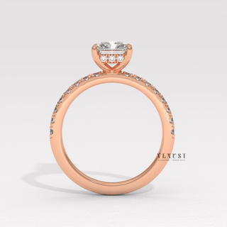 Lifestyle photo of a radiant cut moissanite engagement ring with a pave band on the hand