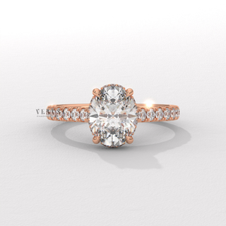 Oval cut moissanite engagement ring with pave sparkle