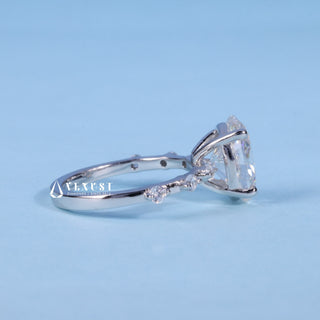 Brilliant 1.50ct oval pave moissanite ring angled view showing its sparkle