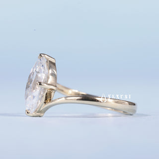 Lustrous 1.0ct marquise moissanite ring angled view showing its sparkle