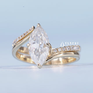 Shimmering 1.0ct marquise moissanite wedding band angled view showing its sparkle