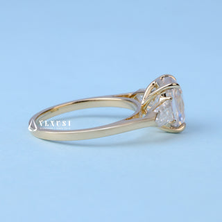 Exquisite 2.0ct cushion three stone moissanite ring angled view showing its sparkle
