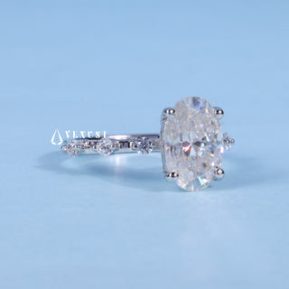 Brilliant 1.50ct oval pave moissanite ring shown on a finger