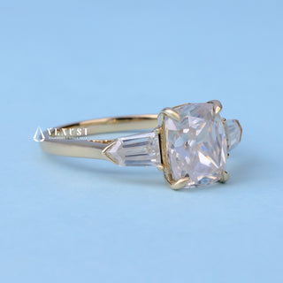 Exquisite 2.0ct cushion three stone moissanite ring shown on a finger