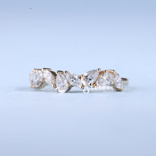 Exquisite marquise cluster moissanite wedding band angled view showing its sparkle