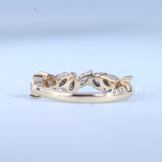Exquisite marquise cluster moissanite wedding band close up of the setting