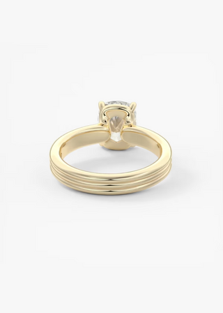 Elongated cushion triple band moissanite ring on hand