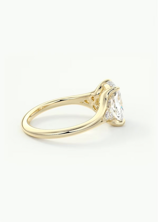Elongated cushion cluster moissanite engagement ring on hand