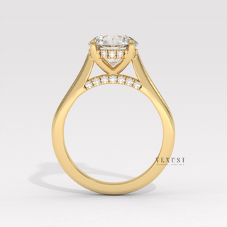 Side profile of a round brilliant moissanite engagement ring with a hidden halo and cathedral setting