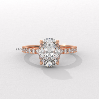 Full view of a oval cut moissanite engagement ring with a hidden halo and half pave band with band detail