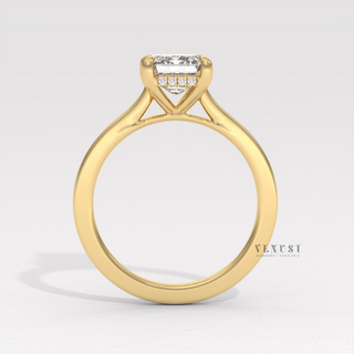 Elegant emerald hidden halo moissanite ring design