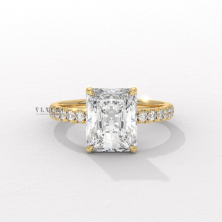 Front view of a radiant cut moissanite engagement ring with a pave band