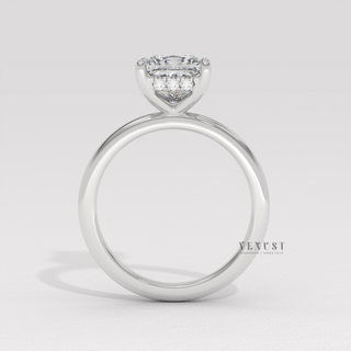 Front view of a princess cut moissanite engagement ring in a hidden halo solitaire setting under bright light