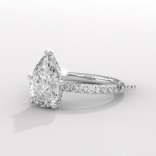 Elegant Pave Pear Cut Moissanite Engagement Ring overhead view