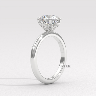 Rose gold round lotus prong moissanite ring