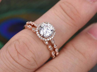Shimmering 0.75ct round halo moissanite ring side profile view