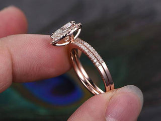 Lustrous 1.0ct pear halo moissanite ring close up of the setting